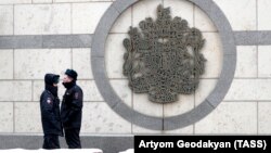 Russian police stand outside the British Embassy in Moscow after a diplomatic spat between the two countries earlier this year.