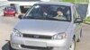 Russian President Vladimir Putin drives a Lada Kalina automobile while visiting the AvtoVAZ plant in Tolyatti in 2007.