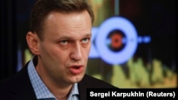 Russian opposition leader Aleksei Navalny speaks in the studio of the radio station Ekho Moskvy in Moscow on December 27.