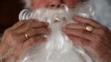 Almaty, Kazakhstan - Dmitry Slektor, 71, a pensioner who worked as a mechanic at a glass factory, poses for a photograph dressed as Santa Claus in his apartment