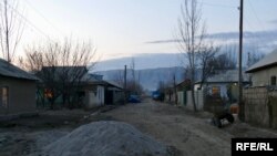Sabzizor, Tajikistan. Without indoor plumbing, most homes have outdoor kitchens and outhouses, making small improvements or adding rooms as family members working as migrants in Russia send money home.