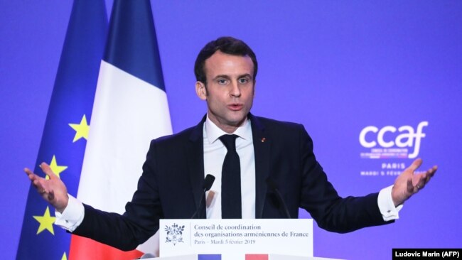 FRANCE -- French President Emmanuel Macron speaks during the annual dinner of the Co-ordination Council of Armenian organisations of France (CCAF), in Paris, February 5, 2019