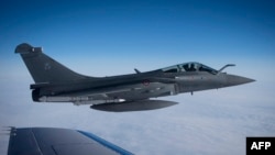 A French Rafale jet fighter flies over France on April 29 as part of efforts to reinforce NATO air patrols over the Baltics.