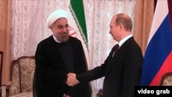 Iranian President Hassan Rohani (left) and Russian President Vladimir Putin at a recent meeting in Bishkek