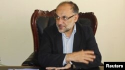 Logar Province Governor Arsala Jamal sits in his office on September 25.