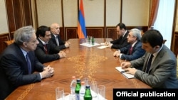 Armenia - President Serzh Sarkisian (C,R) meets with Gagik Tsarukian (C,L), leader of "Prosperous Armenia" party, and the party's parliamentarians, Yerevan,10Apr,2014