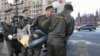 Полицейские задерживают активиста оппозиции, протестующего против закона о митингах. Москва, 5 июня 2012 года. 
