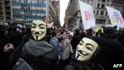 Участники акции движения "Захвати Уолл-Стрит" в Нью-Йорке". 17 ноября 2011 г