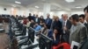 NATO Civilian Representative for Afghanistan Nicholas Kay (2nd R) and British diplomats visited Afghanistan Independent Election Commission National Tally and Data Center to learn about the vote counting prices on October 6.