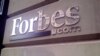 Kazakh Authorities Raid Offices Of Forbes Magazine, Detain Reporter