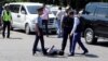 Полиция задерживает подозреваемого в нападении на РОВД