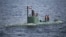 Иранская сверхмалая подводная лодка класса "Гадир", способная устанавливать морские мины, в Ормузском проливе. Январь 2026 года