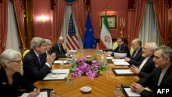 SWITZERLAND-- (From L) US Under Secretary for Political Affairs Wendy Sherman, US Secretary of State John Kerry, US Secretary of Energy Ernest Moniz, Robert Malley, member of the US National Security Council, Iranian Deputy Foreign Minister Abbas Araghchi