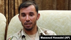 General Abdul Raziq, Kandahar police chief, speaks during an interview with the Associated Press in 2016.