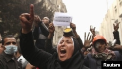 A Egyptian protester shouts slogans during clashes with security forces near the Interior Ministry in Cairo earlier this week.