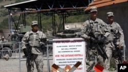 Kosovo -- US soldiers serving in KFOR guard checkpoint in the village of Jarinje, 11Aug2011