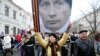 "Наемный менеджер"? Демонстрация в поддержку присоединения Крыма к РФ, март 2014