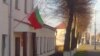 Belarus -- Image displayed upside-down flag on the building of recruiting office in Shklou, 5nov2011