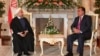 Тәжікстан президенті Эмомали Рахмон (оң жақта) мен Иран президенті Хассан Роухани. Душанбе, 10 қыркүйек 2014 жыл.