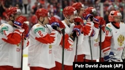 Russian players stand on the ice after losing the U20 Ice Hockey Worlds gold medal match between Canada and Russia in Ostrava, Czech Republic, in January 2020.