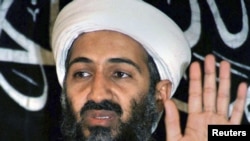 Afghanistan - Osama bin-Laden addresses a news conference in Afghanistan in this 26May1998 file photo. 