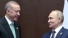 Turkish President Recep Tayyip Erdogan (left) meets with Russian President Vladimir Putin on the sidelines of a conference in Astana in October 2022.
