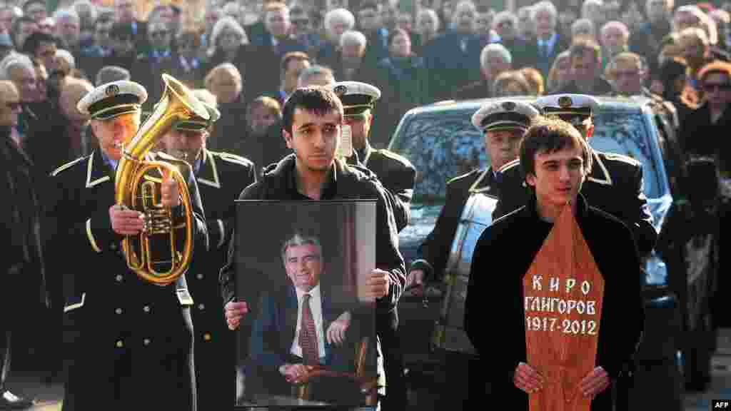 People attend the burial ceremony of first Macedonian President Kiro Gligorov in Skopje. AFP PHOTO/ROBERT ATANASOVSKI