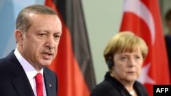 German Chancellor Angela Merkel and Turkish Prime Minister Recep Tayyip Erdogan (file photo)