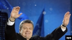 Yanukovych greets supporters during an election rally. He was declared the official winner on February 14.