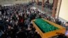 An estimated 2,000 mourners gathered at Simferopol&#39;s Abdal cemetery to lay Reshat Ametov to rest