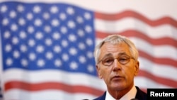 U.S. Defense Secretary Chuck Hagel says the Islamic State poses an "imminent threat" to U.S. interests and "must be defeated."