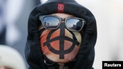 Участник "Русского марша" в Москве, 4 ноября 2014 года