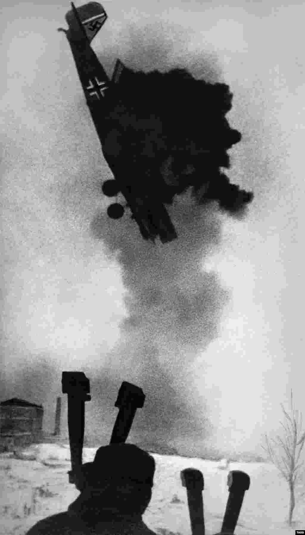 Even the latest digital cameras would struggle to create a crisp image of an airplane plummeting to earth at close-range. This “action” photo from 1942 includes a hand-sketched tree as a bonus.