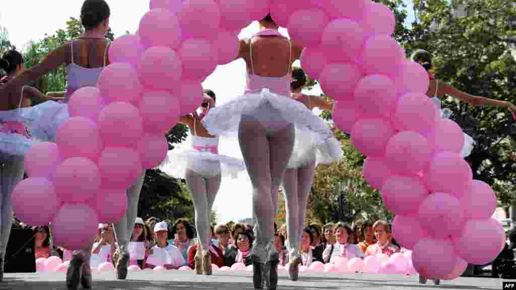 Ethnic Albanian ballet dancers perform during an event to raise breast cancer awareness in the Kosovar capital, Pristina, on October 5. (AFP/Armend Nimani)