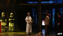 A scene from the musical production Les Miserables, performed by Iranian artists at the Espinas Hotel