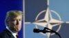 Donald Trump speaks during a press conference on the second day of the NATO Summit in Brussels, Belgium, 12 July 2018