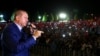 Turkish President Recep Tayyip Erdogan addresses those gathered at the Presidential Complex to protest the July 15 failed military coup attempt in Ankara, August 10.