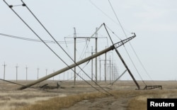 Damaged electricity pylons in Ukraine's Kherson region