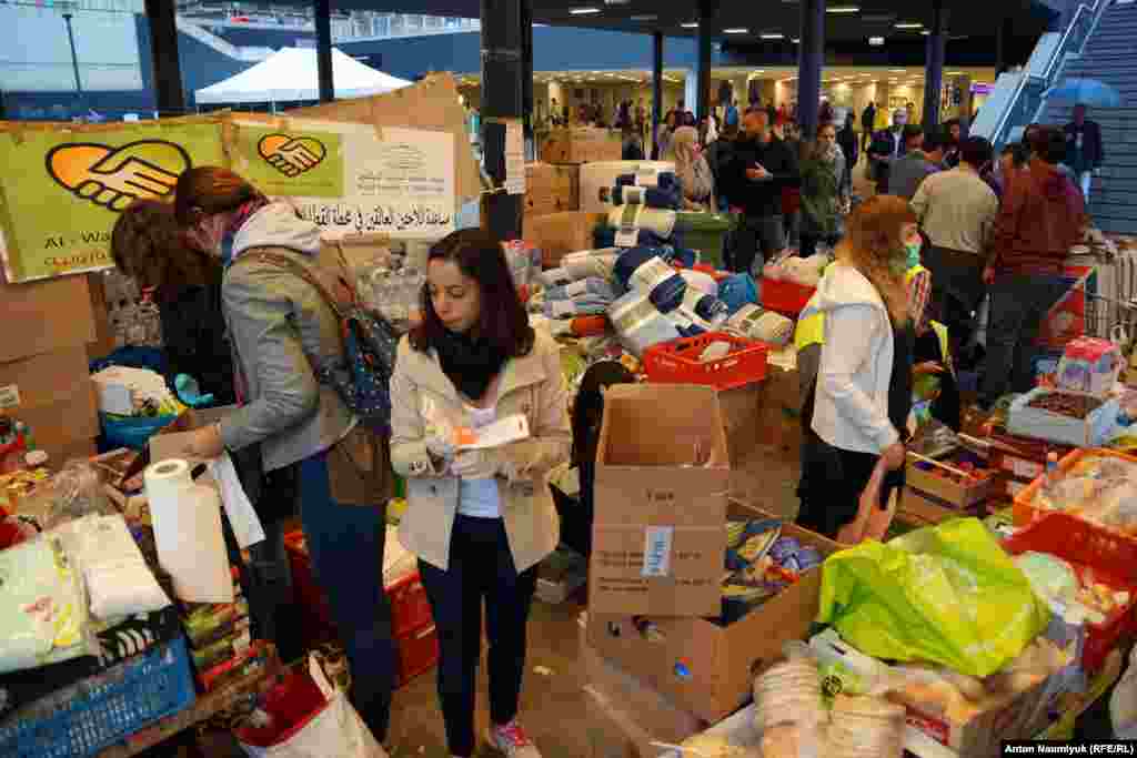 Impromptu supply stations have been set up to provide migrants with basic provisions.