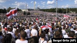 Belarusian opposition supporters rally in the center of Minsk, August 16, 2020