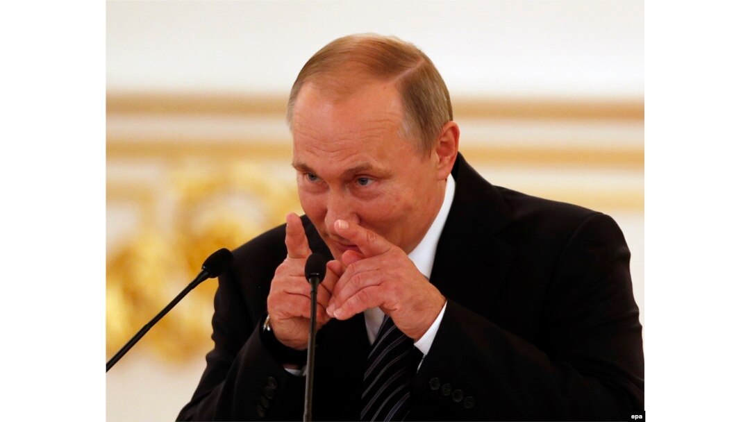 Russian President Vladimir Putin speaks during a ceremony for Russian Olympic medalists returning home from Rio.
