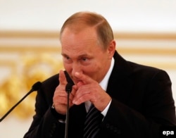 Владимир Путин, раиси ҷумҳури Русия.