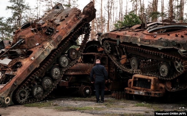 Destroyed Russian armored vehicles on the outskirts of the city of Lyman, which was liberated from the Russian Army on October 5. - Russia's War On Ukraine