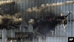 The impact site of American Airlines Flight 11 in the North Tower of the World Trade Center in New York on September 11, 2001, which along with the South Tower collapsed within hours of the coordinated attacks.