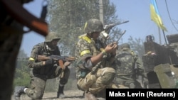 Українські військові під час бою в Іловайську, 26 серпня 2014 року 