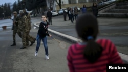 Nagorno Karabakh - Children play on the street in Nagorno-Karabakh's city of Stepanakert, April 7, 2016