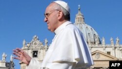 Vatican -- Pope Francis waves from the papamobile during his inauguration mass on St. Peter's square, 19Mar2013