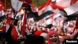 Участники протеста в Каире против правления Мухаммеда Мурси. 3 июля 2013 года.