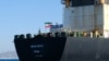 An Iranian flag flutters on board the Adrian Darya oil tanker, formerly known as Grace 1, off the coast of Gibraltar on August 18, 2019.