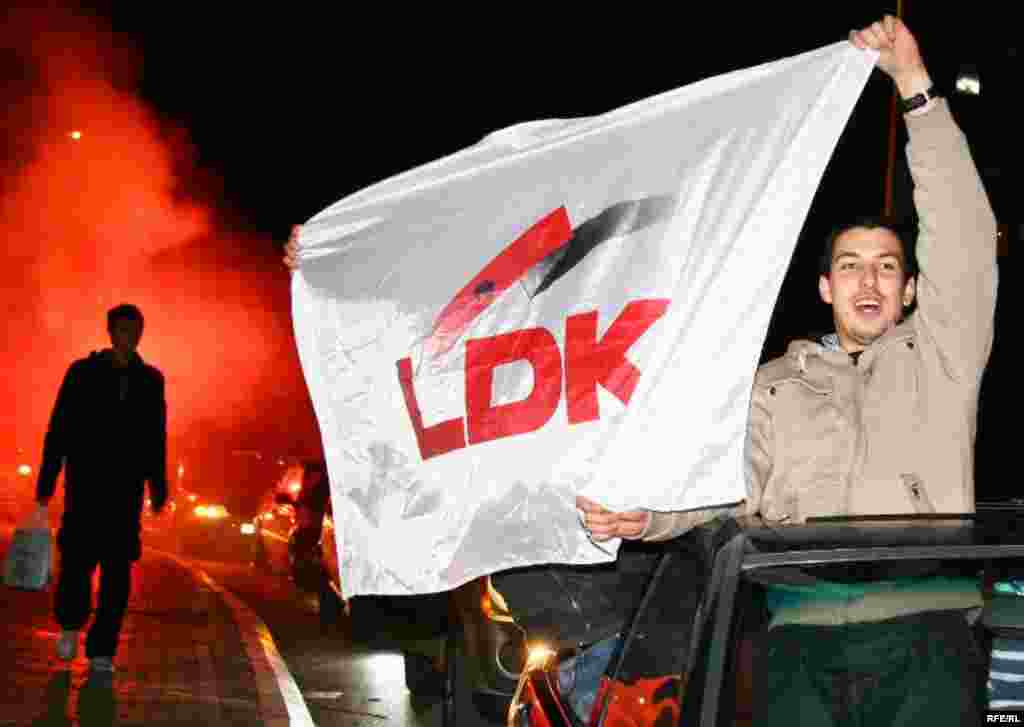 Supporters of the Democratic League of Kosovo celebrate their candidate's victory as mayor of Pristina on November 15. - Kosovo on November 15 held its first elections since it declared independence from Serbia nearly two years ago. Photo by Ridvan Slivova for RFE/RL